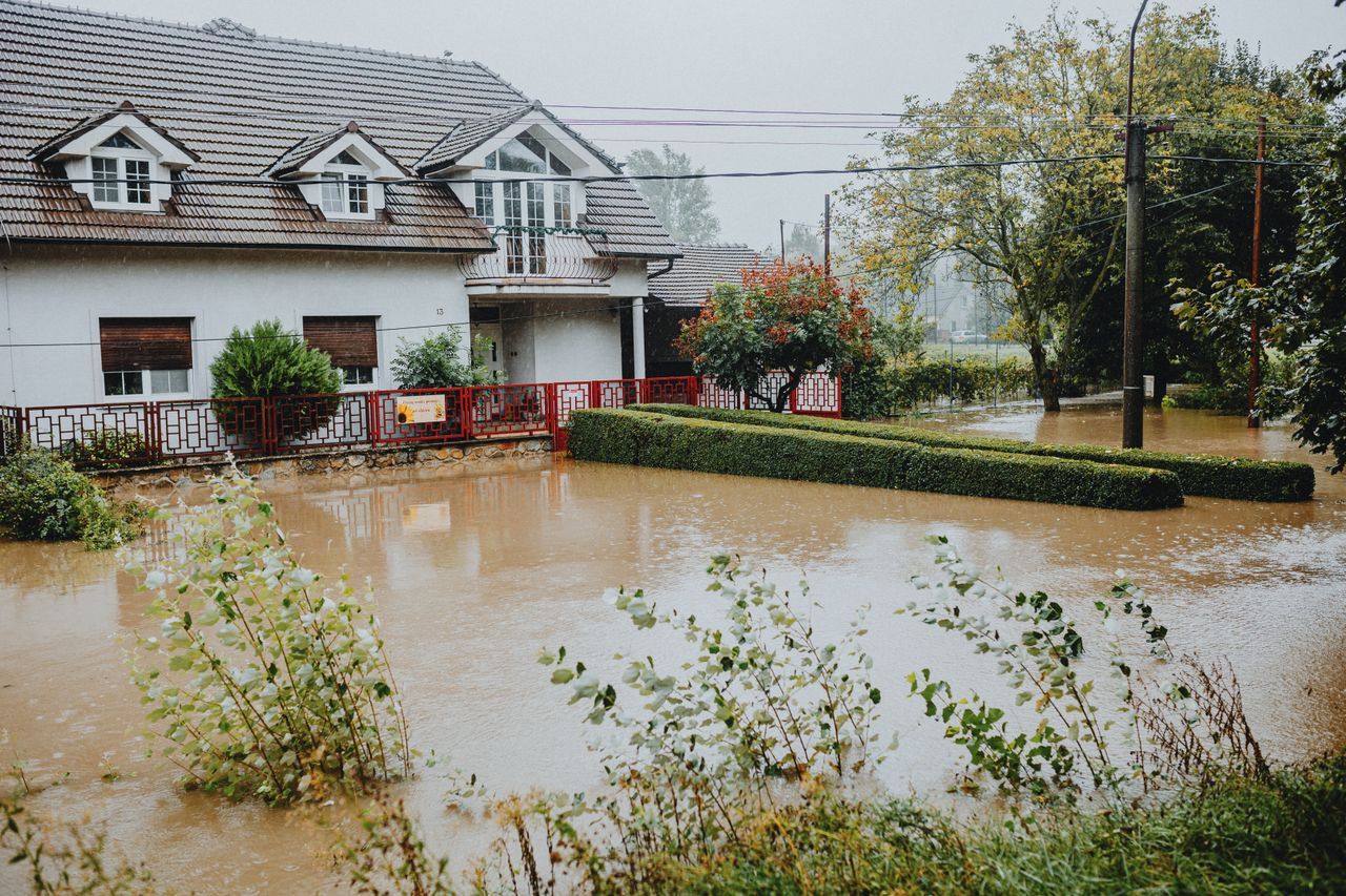 A flooded home yard after heavy rains