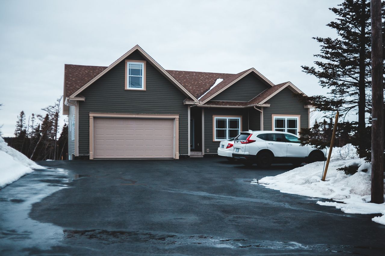A home with garage door in a winter storm outage