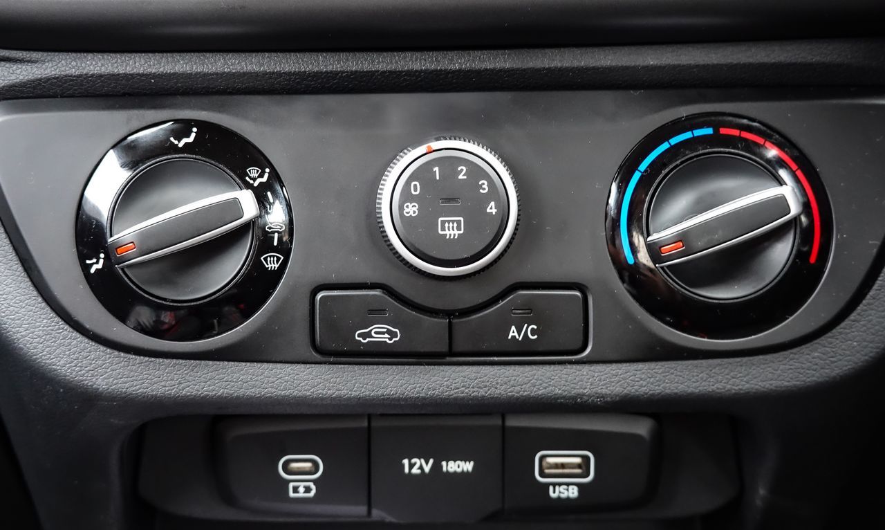 Car dashboard image showing 12v charger